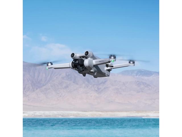 DJI Mini 3 Pro (DJI RC) - & Fly More Kit Lightweight and Foldable 34-min Flight Time Camera Drone Bundle with Built in Monitor, with 128 GB SD, 3.0 USB Card Reader, Landing Pad, Backpack and More